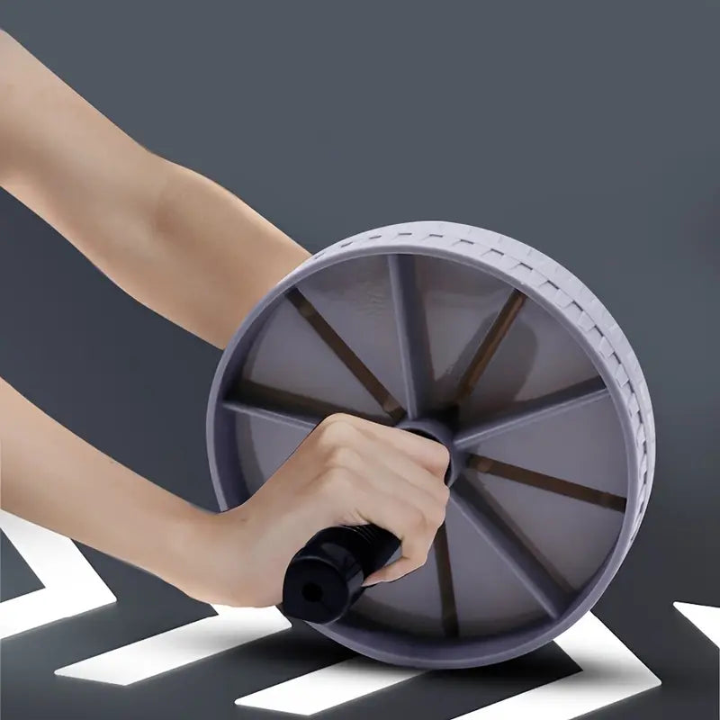 Ergonomski ab roller – neklizajuće drške i stabilna osnova