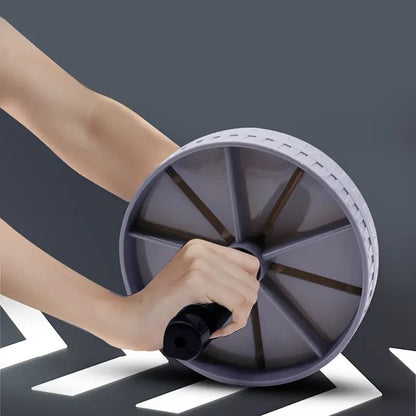 Ergonomski ab roller – neklizajuće drške i stabilna osnova